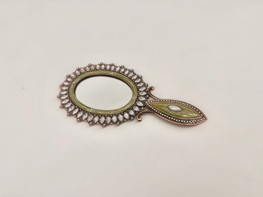 Enameled, jeweled hand mirror